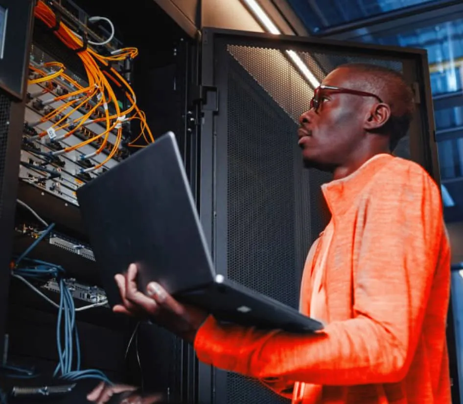 A RingCentral  IT personnel inspecting a motherboard
