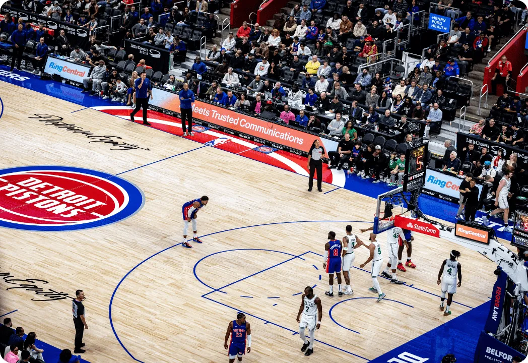 Detroit Pistons basketball players on a court