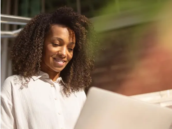 A woman using RingCentral Video app on her laptop
